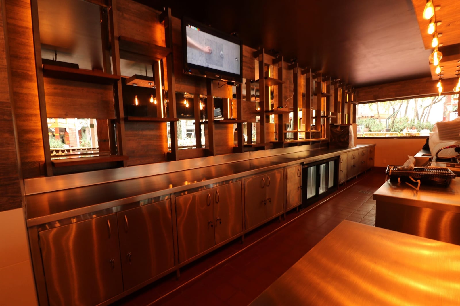 Timber bar and service area of the Sports Bar